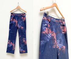 "Vintage 00s America Flag Denim Pants Womens America Jeans Festival Pants W30 USA Flag Jeans Women American Jeans Graphic Pants Boho Jeans 30 D E S C R I P T I O N: 💙 medium weight 💙 zipper and 1 button closure 💙 patterned 💙 2 pockets in front Brand: not labeled Suggested size: D/NL 40, GB 14, F42, I 46, W30 - to ensure a good fit, please check the below measurements carefully). Material: 60 % cotton, 38 % polyester, 2 % elasthan 🧵 M E A S U R E M E N T S 💙Measurements - taken from seam to seam while the garment is lying flat. Please, DOUBLE waist, hips, thigh width, and leg opening!💙 Waist: 15\"/ 38 cm Hips: 18.9\" / 48 cm Thigh width: 9.8\" / 25 cm (crotch to out seam) Front rise: 9.4\" / 24 cm Back rise: 14.2\" / 36 cm Leg opening: 9\" / 23 cm In seam: 31.9\" / 81 cm Out seam: 40 Flag Jeans, Graphic Pants, Graphic Pant, Boho Jeans, Festival Pants, American Jeans, America Flag, Pants Womens, Jeans Women