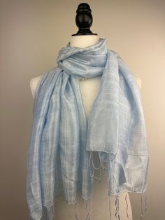 "This is an all season light weight Thai Raw Silk  Shawl. This versatile shawl can be used to dress up an outfit for a special evening, a wedding or as a neck scarf in the winter. Easy to carry anywhere, perfect for when you need it at a restaurant or at the office in air conditioning or a cool summer evening. Effortlessly give a dress a new look by simply adding this shawl. A must have when you travel! COLOR MATCHING/ACURACY The color is very close however is not exact, I tried to to capture th Elegant Blue Dupatta For Spring, Blue Pashmina Silk Shawl, Elegant Blue Pashmina Shawl For Festivals, Blue Pashmina Scarf For Festive Season, Blue Pashmina Scarf For Festive Occasions, Blue Pashmina Scarves For Festive Season, Elegant Blue Pashmina Shawl, Festive Blue Pashmina Scarf, Blue Silk Scarf For Wedding