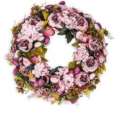 a wreath with pink flowers and green leaves