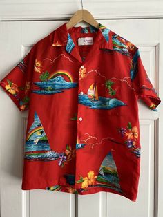 Preowned I53 Vintage Shoreline Hawaii Red Hawaiian Polyester Camp Shirt Mens Medium.  No spots or stains.  No rips, holes, or tears.  Clean and smoke free.  Measures approximately 22.5" from armpit to armpit, 25" from top of shoulder to bottom hem. Red Collared Top For Summer, Red Collared Hawaiian Top, Retro Red Short Sleeve Camp Shirt, Vintage Red Camp Shirt With Camp Collar, Red Retro Shirt With Camp Collar, Retro Red Shirt With Camp Collar, Red Short Sleeve Cotton Camp Shirt, Red Camp Collar Top For Summer, Red Cotton Short Sleeve Camp Shirt