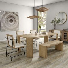 a dining room table with four chairs and an umbrella hanging from it's ceiling