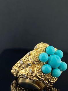 Renown for its lack of variegation matrix and remarkable even Robin's Egg Blue color,  Persian Turquoise comes from the southeastern area of the Caspian Sea, close to old caravan routes.  This ring is a beautiful creation by the renown jeweler Le vian.  Le Vian is a family-owned jewelry company with a long history, dating from the 15th century. As purveyors of fine jewelry, Le Vian had gained such a reputation that in 1746, Nadir Shah, one Persia's most powerful rulers, chose them to safeguard the collection of jewels he had amassed -- including the famous Kooh-i- Noor diamond. A rich history, across centuries. Don't miss this one of a kind heirloom for your collection. Materials: 14 Karat Gold Signed ("Le Vian, and "14k") Gemstones:  Central:  Six (6 ) 3.9mm  Round Genuine Persian Turquoi Luxury Elegant Kingman Turquoise Ring, Nadir Shah, Old Caravan, Persian Turquoise Ring, Persian Jewelry, Caspian Sea, Persian Turquoise, Robin's Egg Blue, Gold Baroque