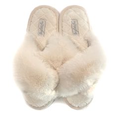 These slippers are ultra cozy, ultra comfortable, and an ultra thoughtful gift. Add luxurious comfort to your day with one step into these fuzzy faux-sheepskin slippers. Featuring water resistant bottom soles, these cross-strap slippers are perfect for indoor or outdoor wear. These cozy house shoes make a perfect addition to any of our signature Taylor Lee Comfort kits. Details Available in Creamy Ivory or Stormy Gray Water resistant soles Available in sizes US 7-8 and US 9-10 Comfort Gifts, Sheepskin Slippers, Outdoor Slippers, Faux Fur Slippers, I Love You Mom, Fur Slippers, Gift Kit, House Shoes, Pink Polka Dots