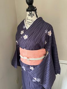 This long traditional kimono is a stunning addition to your wardrobe. Featuring illustration of beautiful color, this kimono captures the elegant spirit of Japan. This kimono is made from fabric that drapes luxuriously over the figure.  Beautiful  cherry flower pattern "komon" kimono is perfect for semi-formal events and other special occasions.   This kimono is in vintage brand new condition (Grade A+). Nagoya obi is made in polyester and an excellent used condition (grade A) with beautiful pattern.   Silk Obijime is included. Kimono can be adjusted to fit wide range of sizes.  fits from 8 to 14. Mitake 168cm yuki 66.5cm ushirohana 30cm Kimono cannot be washed at home because it is silk.  It is the best to be cleaned by professional dry cleaners with kimono experience. These can be sold s Obi Kimono, Cute Kimonos, Japanese Clothes, Cherry Flower, Kimono Design, Traditional Kimono, Dry Cleaners, Womens Kimono, Japanese Outfits