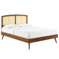 a bed with wooden headboard and foot board on it's sides, against a white background