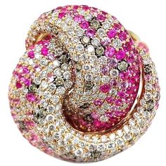 This exquisite ring is crafted from 18-karat gold. It is set with 4.48 carats multi sapphire & 3.76 carats of glittering diamonds. The ring is a size 7 and may be resized to larger or smaller upon request. FOLLOW MEGHNA JEWELS storefront to view the latest collection & exclusive pieces. Meghna Jewels is proudly rated as a Top Seller on 1stDibs with 5 star customer reviews. All items manufactured by us are handmade and can be customized or redesigned. Composition Size-US-7 Gold Weight(Gms)-20.76 Diamond Wt(Cts)-3.76 Multi Sapphire Wt(Cts)-4.48 Extravagant Rings, Vintage Spoon Rings, Kelly Rutherford, Zipper Jewelry, Expensive Rings, Sparkling Jewelry, Ring Rosegold, Turtle Dove, Genie Bottle