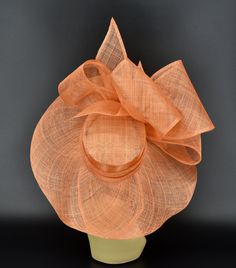 Elegant Orange Costume Hats And Headpieces For Party, Elegant Orange Party Costume Hats And Headpieces, Elegant Orange Fascinator For Races, Elegant Orange Fascinator For Royal Ascot, Elegant Orange Formal Hat, Spring Costume Hat With Short Brim In Sinamay, Elegant High Crown Straw Hat For Beach, Elegant Orange Adjustable Hat, Formal Sinamay Brimmed Boater Hat