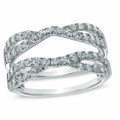 a white gold ring with two rows of diamonds