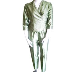 Ingredients Women's Green Shantung Pant Set Includes Three-Quarter Length Sleeved, Wrap Style Top With Pointed Collar. Jacket Includes A Tie-String Wrap-Around Closure That Ties In Back. The Matching Full-Length Pants Feature A Partial-Elastic Waistband With Side-Zip/Button Entry. This Set Is Unlined. Made In The Usa. New (Without Barcode Tag). Fabric Content: 54% Nylon/46% Polyester. Hand Wash, Line Dry. Do Not Dry Clean. Detailed Measurements: * Jacket Length 21 In. (Center Back, Top To Hem); Fitted Pant Set With Pockets For Spring, Fitted Pant Set For Workwear In Spring, Fitted Pant Set For Spring Workwear, Spring Green Workwear Pant Set, Spring Workwear Green Pant Set, Green Pant Set For Spring Workwear, Spring Green Fitted Pantsuit, Spring Formal Green Pantsuit, Spring Green Formal Pantsuit