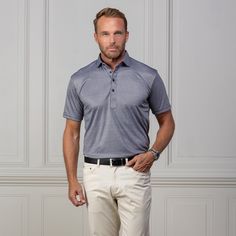 The versatile Semi-Spread Collar Polo. Woven for comfort and designed for style. This shirt pairs a formal semi spread dress collar with an extra comfortable, 4-way stretch, short-sleeved polo. The semi-spread collar has all the benefits of our ever popular English spread collar with a streamlined size and built to accommodate a larger tie knot Throw a sweater on over it or a tie and jacket to be comfortable for work, a date or zoom call. Get all the upside of a formal collar without the discomf Fitted Polo Collar Shirt For Semi-formal Occasions, Classic Short Sleeve Golf Shirt, Fitted Button-up Polo Shirt For Business Casual, Formal Fitted Polo Shirt With Placket, Business Casual Polo Shirt With Spread Collar, Fitted Short Sleeve Golf Shirt, Formal Summer Collared Polo Shirt, Formal Summer Polo Shirt, Formal Fitted Polo Shirt With Spread Collar