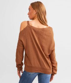 Women's Cold Shoulder Top In Brown By Daytrip., Women's Chestnut Open weave raw edge top Bust measures 40 on size small Body length 23 1/2 on size small. 45% Rayon 30% Nylon 23% Polyester 2% Spandex. Machine wash cold gentle cycle. Do not bleach. Tumble dry low. Iron on low if necessary.. Measurements: Bust -Fullest part of bust with arms at sides. Waist -Circumference of natural waist: above belly button below rib cage. Hips -Standing with feet together fullest part of hips. WOMEN'S TOP SIZE CO Brown Relaxed Fit Knit Tops, Brown Cotton Knit Top For Fall, Brown Cotton Knit Top For Spring, Brown Tops For Day Out In Winter, Brown Tops For A Winter Day Out, Casual Brown Knit Top For Spring, Open Weave, Waist Circumference, Top For Women