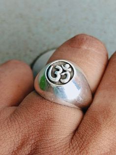 This is a listing of Om sterling silver Ring , this is very unique ring for your love ones. This ring is made on base of INDIAN GOD SHIVA It is a Very unique Ring, You will love it and It look more amazing in your Hand. It would make a very special gift for somebody you love! Metal = Silver Material :- 925 Sterling Silver Ring Size - Available in all Size Band Color - silver Handmade Crafting bohemian Ring - This style has bohemian style . it will look beautiful when you wear it .. Thanks for vi Symbolic Silver Open Ring, Adjustable Spiritual Sterling Silver Engraved Ring, Sterling Silver Rings With Polished Finish In Spiritual Style, Sterling Silver Spiritual Rings With Polished Finish, Spiritual Sterling Silver Rings With Polished Finish, Adjustable Hallmarked Spiritual Signet Ring, Symbolic Engraved Ring Stamped 925 For Promise, Adjustable Sterling Silver Spiritual Signet Ring, Spiritual Open Ring With Polished Finish