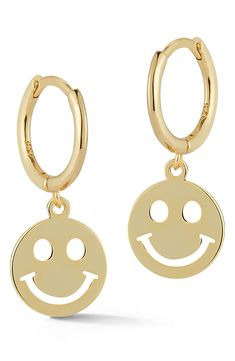 Be happy in these gold vermeil huggie earrings with cheerful smiley face drops for whimsical style. Yellow gold vermeil over sterling silver smiley face drop huggie earrings. Hinged post back. ImportedOrders cannot be shipped to Canada, Puerto Rico, APO, FPO or P.O. Boxes. Novelty Gold Earrings, Gold Dangle Fun Jewelry, Fun Gold Dangle Jewelry, Novelty Gold Hypoallergenic Earrings, Gold Hypoallergenic Novelty Earrings, Playful Gold Hypoallergenic Earrings, Playful Hypoallergenic Gold Earrings, Playful Adjustable Gold Earrings, Gold Fun Drop Earrings