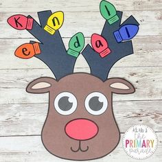 a paper reindeer with letters on it's antlers