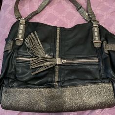 Like New, Never Used With No Markings Or Scratches On Bag. Comes With Two Zipper Compartments On The Front And Back. Great For Everyday Wear! Silver Satchel Shoulder Bag With Metal Hardware, Silver Satchel With Metal Hardware For Everyday Use, Silver Leather Trendy Satchel, Trendy Silver Leather Satchel, Silver Travel Satchel With Adjustable Strap, Silver Leather Satchel Shoulder Bag, Silver Satchel With Adjustable Strap For Travel, Leather Shoulder Bag With Zipper For Night Out, Silver Leather Shoulder Bag With Adjustable Strap