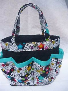 three purses are stacked on top of each other with different designs and colors in them