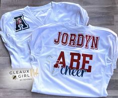 a jersey with the name jordan are cheer written on it next to a sticker