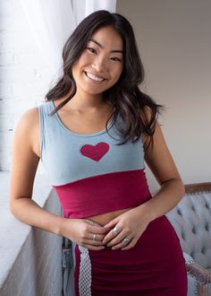 Here is an adorable crop top for a petite woman. It’s soft, comfortable, and cool. Layer it or wear on its own. These match perfectly with the Phoebe Jackets in stone blue or grey. Wear with pants or matching ruched skirts. Runs small. Notice that there is a double heart option for a few of these. The details: Back length, measured from the back neck to hem: 13.5 inches. 47.5% Organic cotton, 47.5% Soy, 5% Spandex Soft and absorbent, naturally antibacterial and UV resistant Designed just for pet Petite Woman, Ruched Skirt, Double Heart, Petite Women, Sustainable Fashion, Organic Cotton, Crop Top, Spandex, Crop Tops