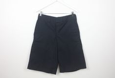 Vintage Dickies brand shorts Size 30 waist Waist - 30 inches Inseam - 12 inches Hips - 36 inches Rise - 11 inches Great condition cai34 90s Style Relaxed Fit Cotton Shorts, Black Bermuda Shorts With Belt Loops For Summer, Black 90s Style Summer Shorts, 90s Black Summer Shorts, 90s Black Shorts With Pockets, Black 90s Shorts With Pockets, Fitted Black Cotton Bermuda Shorts, 90s Style Fitted Shorts For Streetwear, Black Cotton Bermuda Shorts With Short Inseam