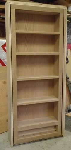 an unfinished bookcase in the process of being built