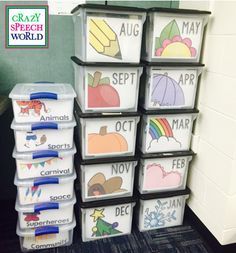 a stack of plastic containers sitting on top of a floor next to a white wall