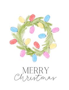 a watercolor christmas wreath with lights on it