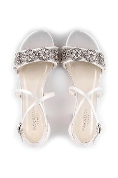 The elegant Evangeline low heel sandal is adorned with stunning pearl and crystal trims shaped into pretty flowers. The stable block heel will add extra comfort to your special day. Stable Block, Satin Wedding Shoes, Crystal Trim, Low Heel Sandals, Satin Wedding, Heel Sandal, Ankle Strap Sandals, Pretty Flowers, Low Heels