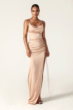 Reva' is our most elegant creation to date and the dress you've been waiting for. This satin Cowl Neckline dress is here to make your day perfect! Soft and luxurious woven satin shapes this luxe gown with a classy cowl neckline and slender rolled straps that crisscross atop the backless bodice. Sheath silhouette is sure to compliment your figure as it hugs the hips and gracefully leads into a long maxi skirt.'Reva' is fully lined for a smooth and seamless finish and has a zip to the side for eas Cowl Neckline Dress, Trumpet Evening Dress, Long Maxi Skirt, Backless Maxi Dress, Backless Bra, Long Maxi Skirts, Backless Maxi Dresses, Cowl Neckline, Necklines For Dresses