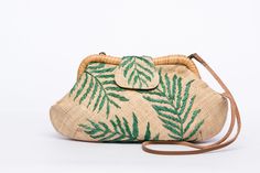 The Palm Leaves Signature Larone purse is your "happy" bag! And one that has a happy story to tell too! The body material is woven by women weavers, wives of fishermen and farmer who supplement the family income through their weaving. Each daisy is embroidered with sustainable, all-natural raffia fibers by women in urban areas who work from home as they take care of their family. Cue happy sigh and smile! - Measurements: 12" width x 3" depth x 7" height, leather strap 19" drop - Body: 100% raffia, Lining: 100% polyester, Frame: 100% rattan, strap: 100% cow leather - Made in the Philippines in our own atelier in collaboration with weavers and artisans - Free shipping anywhere in the USA From the time my mother began her little workshop for handbags over 35 years ago, we have stayed true to Embroidered Natural Straw Travel Bag, Natural Embroidered Straw Bag For Daily Use, Embroidered Natural Shoulder Bag For Travel, Embroidered Rectangular Natural Straw Bag, Embroidered Natural Rectangular Shoulder Bag, Handwoven Natural Clutch For Everyday Use, Natural Handwoven Clutch For Daily Use, Traditional Handwoven Clutch Bag, Traditional Embroidered Natural Color Bag