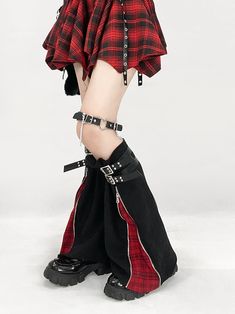 This pair of leg warmers features a unique zipper closure design. When unzipped, they reveal a striking red plaid pattern, adding a touch of flair and creativity to your outfit. The leg warmers are adorned with buckle strap decorations, further enhancing their stylish appeal.  Please note that the price includes one pair of leg warmers. Punk Bottoms With Zipper Closure For Fall, Punk Style Bottoms With Zip Fly For Fall, Fall Punk Bottoms With Zipper Closure, Alternative Style Bottoms With Zipper For Fall, Alternative Style Bottoms With Zipper Closure For Fall, Edgy Winter Bottoms With Zip Fly, Plaid Bottoms For Fall Streetwear, Gothic Red Bottoms For Fall, Red Punk Bottoms With Belt Loops