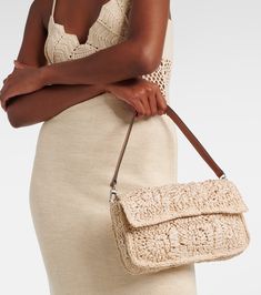 Intrecciato Weave Crochet Shoulder Bag For Vacation, Summer Beige Crochet Bag With Intrecciato Weave, Chic Crochet Bag With Detachable Strap For Vacation, Chic Crochet Bag With Intrecciato Weave, Luxury Crochet Shoulder Bag With Adjustable Strap, Vacation Beige Shoulder Bag With Intrecciato Weave, Beige Intrecciato Weave Crochet Beach Bag, Beige Crochet Bag With Intrecciato Weave For Beach, Beach Crochet Bag With Intrecciato Weave And Top Handle