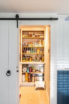 an open pantry with lots of food in it