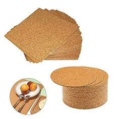 cork placemats and coasters set on top of each other next to a plate with two oranges