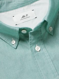 DESIGNED BY MR PORTER. Mr P.'s designs focus is on wardrobe staples created using the highest-quality fabrics around and this shirt delivers on both counts. It's made from organic cotton Oxford, chosen for its pleasingly weighty handle and durable finish. It's topped with a button-down collar. This product is part of Mr P.’s PERMANENT collection, a range of premium everyday staples designed to form the foundation of the modern man’s wardrobe. Lower Impact Materials. This product is made using a… Oxford Shirt Men, Mr P, Plain Shirts, Oxford Shirt, Button Down Collar, Modern Man, Mr Porter, P S, Wardrobe Staples