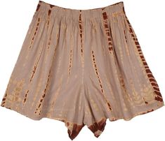 These soft and comfortable shorts are good for a multitude of aesthetics, from earth core to country to apt to wear to festivals.  The casual shorts have an elastic drawstring waist and feature a captivating brown and beige scale tie-dye effect, adding a unique touch to your outfit. #tlb #beachwrap #TieDye #bohemianfashion #FestivalWear Brown Hippie Bottoms For Festival, Hippie Style Brown Bottoms For Festival, Hippie Style Brown Festival Bottoms, Casual Brown Bottoms For Festival, Hippie Style Brown Bottoms For Spring, Brown Bottoms For Festival, Brown Bottoms For Spring Festival, Brown Festival Bottoms With Elastic Waistband, Hippie Brown Bottoms With Elastic Waistband