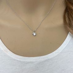 Description: 10k Solid White Gold Mini Small Cz Pendant Necklace - April Birthstone Item No.: 5252mz Metal Type: 10k White Gold Metal Color: White Gold Measurement: Stone: Cubic Zirconia Pendant W/Chain Weight: 1.4 - 1.55 Grams (Vary From Chain) Pendant : 11 X 6 Mm. Chain: 1.2 Mm Chain Available In 16", 18", 20" Brand New Cubic Zirconia Solitaire Necklace With Round Cut Gemstone, Cubic Zirconia Solitaire Gemstone Necklace, Solitaire Cubic Zirconia Necklace With Gemstone, Gift Diamond Necklace With Single Cut Crystals, Diamond Necklace With Single Cut Crystals As A Gift, Diamond-shaped White Diamond Necklace, Solitaire Cubic Zirconia Necklace With Round Pendant, White Diamond-shaped Diamond Necklace, Anniversary Crystal Solitaire Necklace With Diamond Accents