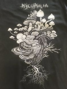 a black shirt with mushrooms on it and the words myophilia written in white