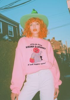 Sorry for being spooky and weird! I just am that way, but don't worry it will definitely happen again.  For the weird babes this spookiest of seasons. Cute retro Halloween design on a unisex crewneck sweatshirt in Pink. 100% cotton. Model wears size Small. Cute Clown Costume, Spooky Sweatshirt, Colorful Outfit, Western Tee, Cute Clown, Pride Tees, Womens Sweatshirts, Clown Costume, Halloween Sweater