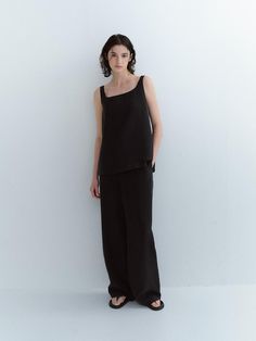 Loose-fit sleeveless top in jersey. Square neck at front and back. - Regular length- Sleeveless- Loose fit Chic Sleeveless Viscose Tank Top, Chic Viscose Sleeveless Tank Top, Viscose Sleeveless Blouse Tank Top For Work, Black Sleeveless Viscose Top, Sleeveless Viscose Tank Top For Work, Sleek Sleeveless Summer Camisole, Versatile Sleeveless Viscose Tank Top, Versatile Viscose Sleeveless Tank Top, Sleek Sleeveless Workwear Top