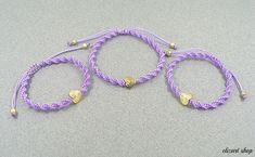 "Mommy and me bracelets, mother daughter matching bracelets, heart bracelets, mother son bracelets, first day of school bracelets. This beautiful bracelet set can be the perfect gift for mother and daughter or mother and son! It consists of two light purple macrame bracelets with gold plated heart charms in the middle. For the bracelets I have used high quality light purple thread for macrame. Mother's bracelet has an adjustable closure so it can fit every woman's wrist. Daughter's bracelet is a Handmade Heart Bracelet For Mother's Day, Adjustable Heart-shaped Bracelet As A Gift For Mom, School Bracelets, Mommy And Me Bracelets, Purple Macrame, Bracelets Heart, Heart Bracelets, Mother Daughter Bracelets, Mothers Bracelet