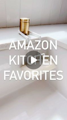 a bathroom sink with the words amazon kitchen faucets written in white and gold