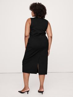 This tailored midi dress uses our Everywhere Ponte fabric, engineered with special stretch fibers for a smooth and supportive fit.  Here, we chose a column silhouette and a notch-neck so you can easily dress it up or down as your schedule requires.  Column fit.  Sustainability: Made with Birla Livaeco™ viscose, a fiber derived from renewable wood resources and sourced from responsibly managed forests.  Birla Livaeco™ viscose is manufactured using a stringent closed-loop process that significantly reduces carbon emissions and water consumption as compared to generic viscose.  Crew neck with notch.  Side-seam pockets.  Center-back vent.  Unlined.  Column fit.  Sleeveless.  Midi length.  Model: Size S, 5'10" (178cm). Water Consumption, Black Midi Dress, Carbon Emissions, First Look, Midi Length, Banana Republic, Sustainability, Cashmere, Midi Dress