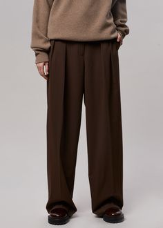 Color: Chocolate Soft woven suiting fabric with light stretch Baggy oversized silhouette Hook and bar closure Zip fly Unlined 72% Polyester 22% Rayon 4% Wool 2% Spandex Dry Clean By The Frankie Shop. Imported Product Measurements: S- 28" Waist, 46" Hip, 13.5" Rise, 31" Inseam M- 30" Waist, 48" Hip, 13.75" Rise, 31.5" Inseam L- 32" Waist, 50" Hip, 14" Rise, 32" Inseam Model is 175cm/5'9" wearing size S Slacks Outfit, Brown Pants Outfit, Pants Outfit Men, Classy Outfits Men, The Frankie Shop, Suiting Fabric, Mens Casual Dress Outfits, Men Stylish Dress, Guys Clothing Styles