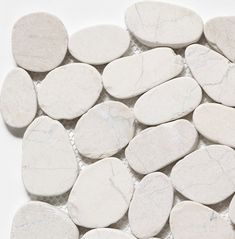 white marble pebbles laid on top of each other