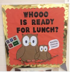 a bulletin board with an image of two owls and the words who is ready for lunch?