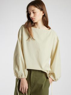 This is a modern and comfortable blouse by L’EAU that is made out of high quality fabric. With unique design detail and trendy mood, you can style it for your casual and young daily outfit.- Square neckline- Dropped shoulderline and wide armhole- Adjustable string on the sleeve- Natural volume fit Workwear Long Sleeve Blouse With Elastic Shoulders, Chic Blouson Sleeves Long Sleeve Top For Summer, Chic Puff Sleeve Top With Elastic Shoulders For Work, Workwear Tops With Elastic Shoulders And Long Sleeves, Long Sleeve Tops With Elastic Shoulders For Work, Elastic Shoulder Long Sleeve Tops For Work, Relaxed Fit Tops With Blouson Sleeves For Work, Relaxed Fit Blouson Sleeve Tops For Work, Relaxed Fit Workwear Tops With Blouson Sleeves