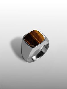 Discover the perfect blend of elegance and masculinity with our stunning square tiger eye ring, crafted from high-quality sterling silver. This vintage-inspired gold signet ring features a captivating natural tiger eye gemstone, known for its rich brown hues and striking chatoyancy, making it a unique addition to any man's jewelry collection. Ideal for everyday wear, this ring not only serves as a stylish accessory but also symbolizes strength and confidence, making it a thoughtful promise ring Brown Sterling Silver Signet Ring With Polished Finish, Modern Brown Rings For Gifts, Modern Brown Rings For Gift, Tigers Eye Ring, Promise Rings For Him, Unique Mens Rings, Natural Gemstone Ring, Gold Signet Ring, Tigers Eye Gemstone