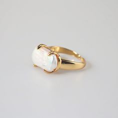 Modern Gold Pearl Ring, Elegant Gold Baroque Pearl Ring, Elegant Gold Pearl Ring With Baroque Pearl, Elegant Gold Rings With Baroque Pearls, Elegant Gold Pearl Ring With Charm, Baroque Pearl Ring With Pearl Drop For Weddings, Elegant Baroque Pearl Drop Ring, Gold Baroque Pearl Ring Gift, Gold Baroque Pearl Ring As Gift