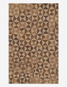 a brown and tan rug with triangles on it