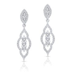 These ornate white gold earrings swing gracefully from your ears in long arcs, covered with small sparkling diamonds. Elegant White Platinum Bridal Earrings, Platinum Bridal Earrings With Diamond Accents For Evening, Elegant Platinum Bridal Earrings For Anniversary, Classic Diamond Chandelier Earrings With Diamond Accents, Classic Diamond White Chandelier Earrings With Brilliant Cut, Classic Chandelier Earrings In Diamond White, Elegant Bridal Earrings With Brilliant Cut Platinum, Elegant Platinum Drop Bridal Earrings, Elegant Platinum Bridal Drop Earrings